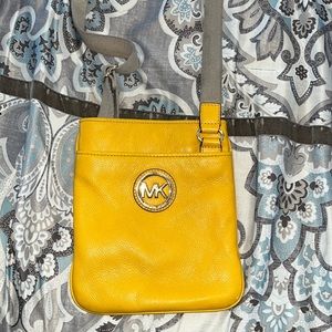 Michael Kors, canvas strap yellow Crossbody purse good condition
